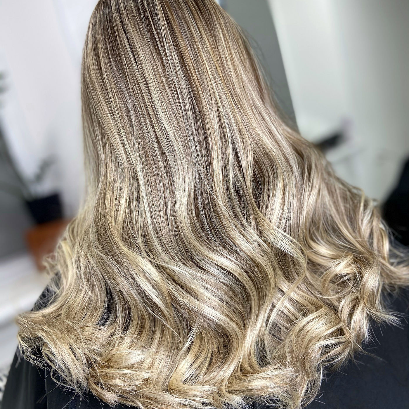 Soft highlights and toning by the Haven Hair Studio team